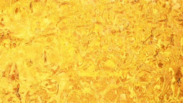 Super Slow Motion Shot of Golden Liquid Luxury Background at 1000Fps