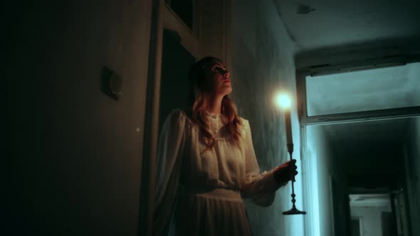 Vintage Woman in an old Horror House