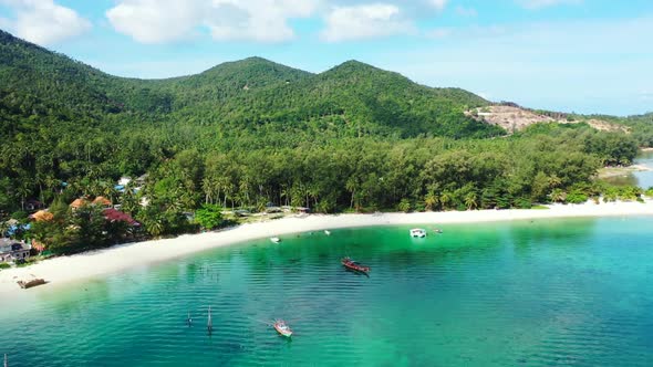 Aerial flying over abstract of idyllic sea view beach trip by blue green lagoon and white sand backg