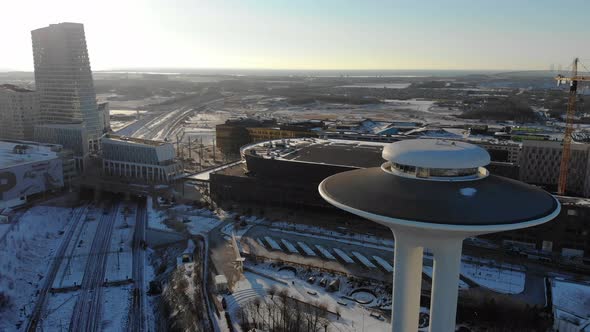 Drone view of Hyllie water tower, Malmö arena, Emporia, Öresundsbron. Wintertime, Malmö Sweden