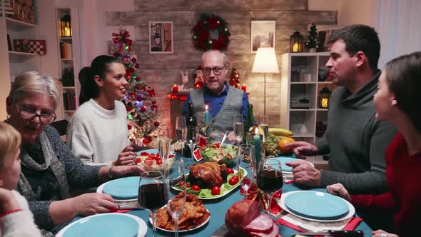 Grandfather Sitting at the Head of the Table