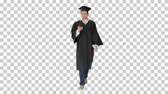 Male student in graduation gown checking, Alpha Channel