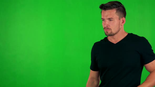 Young Handsome Caucasian Man Wakes Up and He Is Suprised - Green Screen - Studio