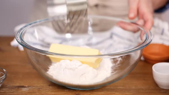 Step by step. Mixing ingredients to make dough for empanadas.