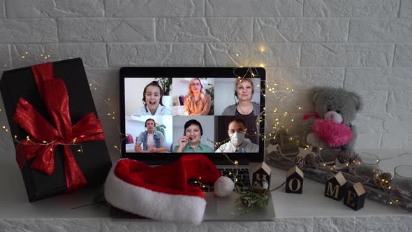 Video Call Celebrating Christmas By Laptop Online During Coronavirus Outbreak