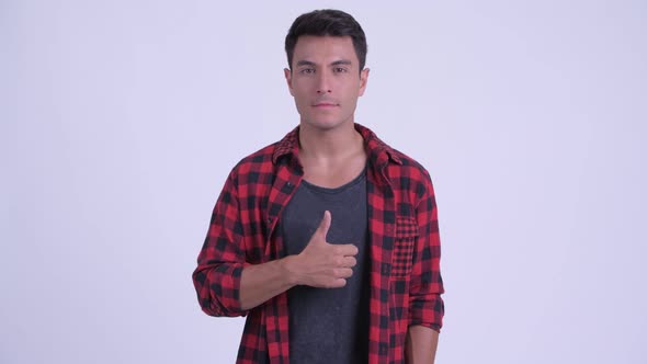 Happy Young Hispanic Hipster Man Giving Thumbs Up