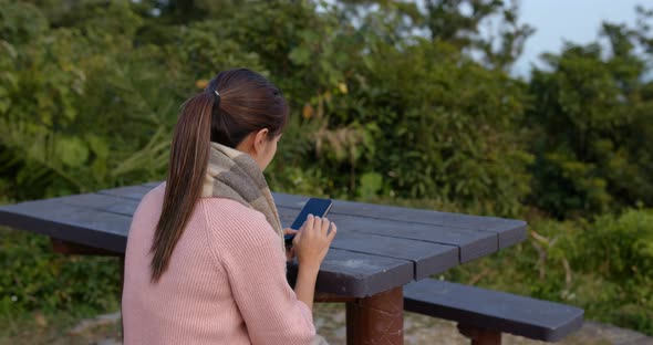 Woman go countryside and look at the sea