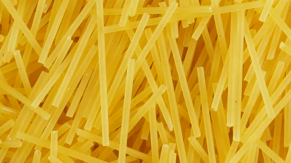 Spaghetti - yellow pasta, ready for cooking.