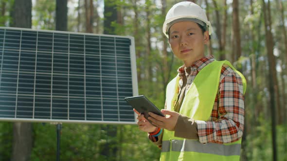 Woman Working In Solar Array