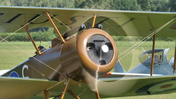 Closeup First World War British Historic Military Biplane with Engine Running