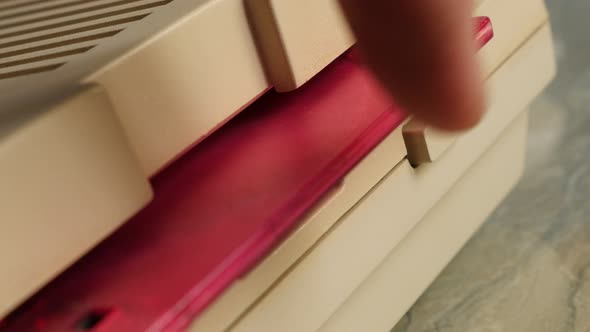 Pink ancient floppy disk inserting  in personal computer 4K 3840X2160 UltraHD footage - Floppy disk 
