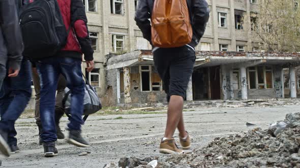 People Walking in Refugee Camp