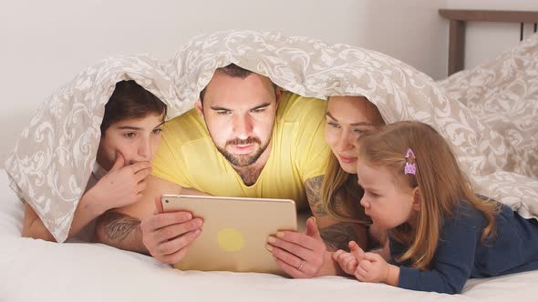 Lovely Family on Bed, Spend Morning Together