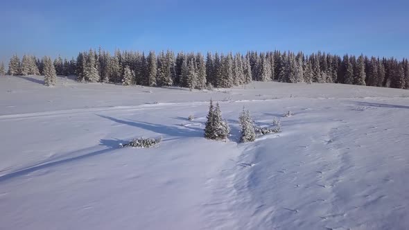 Flying Over Beautiful Landscape of Winter Mountains