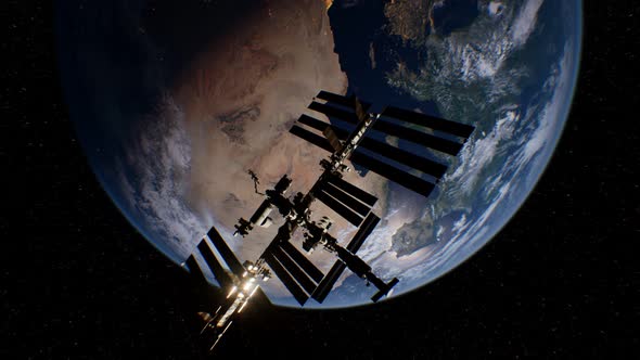 International Space Station in Outer Space Over the Planet Earth Orbit alt