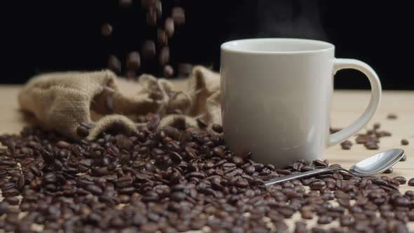 Steamy Cup of Coffee Seeds Falling