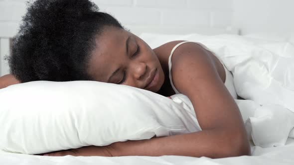 Serene African American Woman Sleeping Waking Up in Comfortable Bed Lying on Soft Pillow Orthopedic