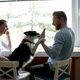 Beautiful Couple Relaxing at Home and Loving Their Dog - VideoHive Item for Sale