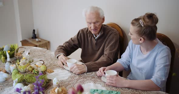 Happy Easter - Grandfather Talking with Granddaughter