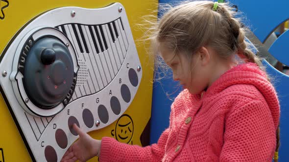 Interested Blonde Junior Schoolgirl Pretends Playing Piano