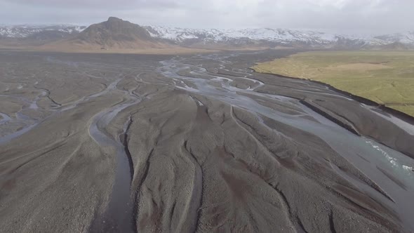 Winter landscape aerial view in Iceland with rivers coming from the mountains