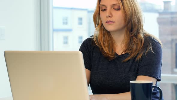 Woman using laptop