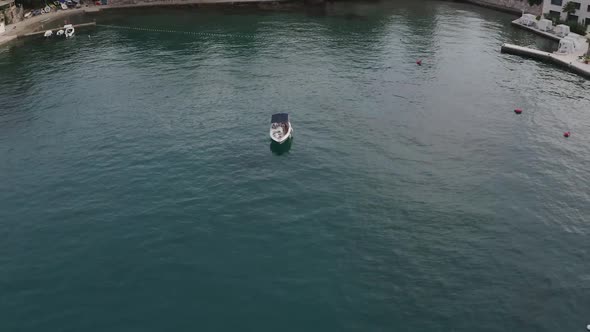 Aerial view of the speedboat in a beautiful nature ocean landscape with people. Summer holiday vacat