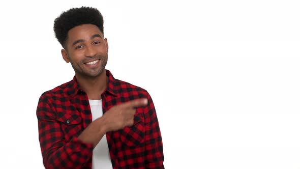 Copy Space Portrait of Smiling Mixedrace Guy with Bristle in Red Plaid Shirt Pointing Finger Showing