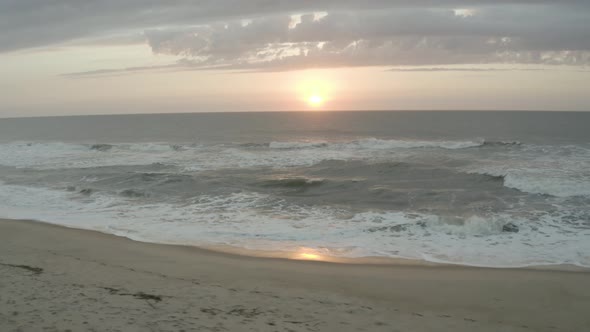 Side follow view of the sunset while on the beach