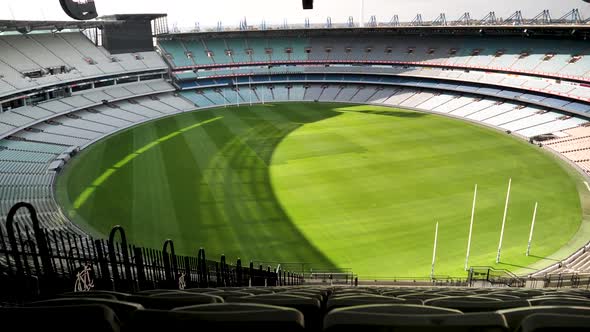 Pan across the Melbourne Cricket Ground top tier, empty during the COVID lockdown in Australia.