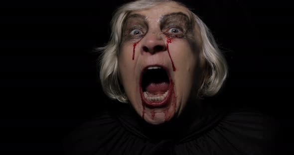 Old Witch Halloween Makeup Elderly Woman Portrait with Blood on Her Face