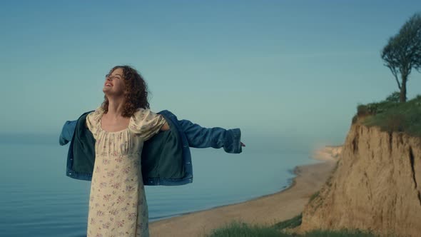 Happy Woman Enjoy Nature on Sand Sea Beach