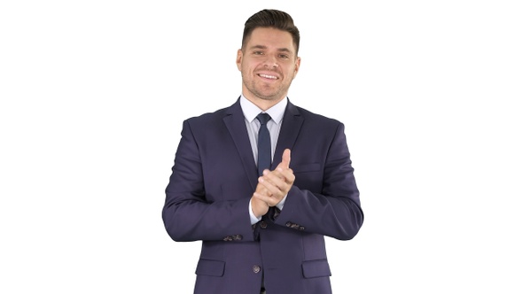 Smiling businessman clapping hands on white background.