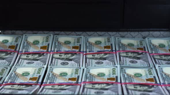 Man Opens and Turns Case Full of Cash Money