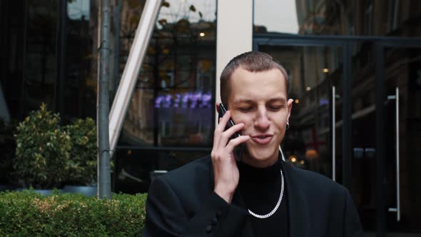 Portrait Handsome Caucasian Man Having Phone Talk Outdoor. Businessmen Talking on Smartphone on