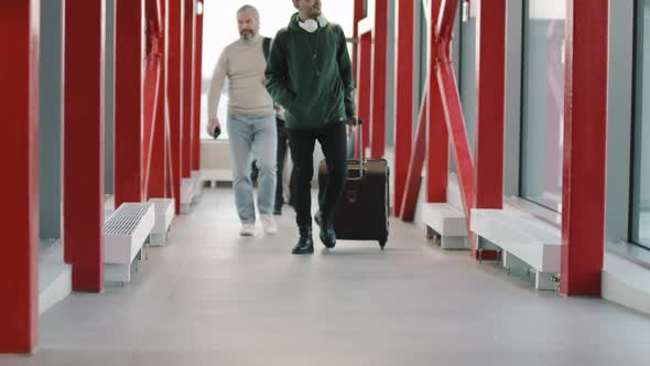 Passengers Walking Down Ramp