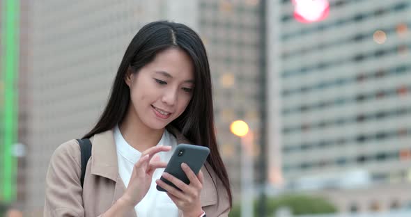 Young Business Woman Work on Mobile Phone at Night