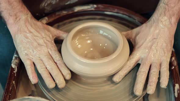 Top View Senior Man Making a Cup During Pottery Art