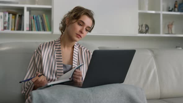 Focused Student Watching Webinar at Home Office Closeup