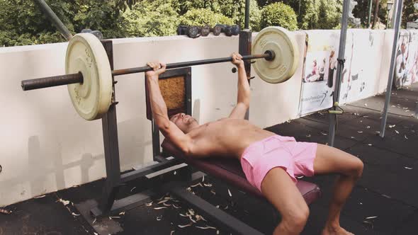 Man's Legs in Frame Doing Tire Flipping Exercises