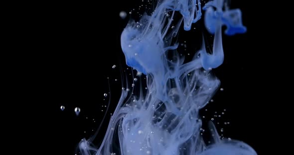 Blue Ink Drops Spread in Water, Small Air Bubbles and Colored Smoke Spreading Underwater on Black