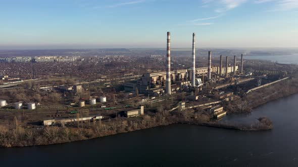 Industrial Plant With Smoking Pipes in the City. Industrial Zone. Modern Cleaning Technology