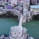 Aerial Drone View Of City Of Old Bridge And Neretva River In Mostar 4K - VideoHive Item for Sale