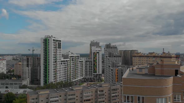Aerial View of Apartment Buildings in Modern Town at Summer Day