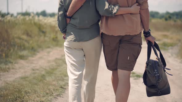 Couple On Safari Clothes Style. Inspiration Travel On Africa. Stylish Outfit On Wildlife Landscape.