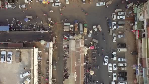 Aerial view above of crowded street market, Phnom Penh, Cambodia.
