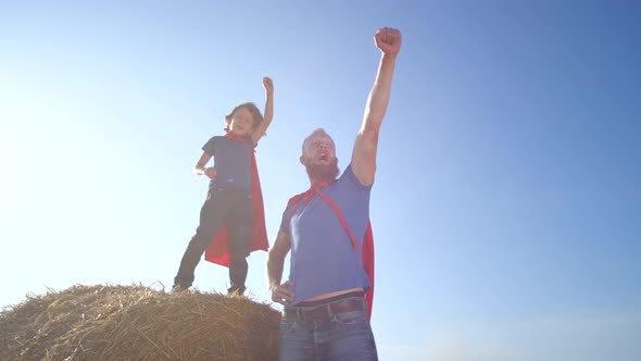 Playful Family of Brave Superheroes on Guard