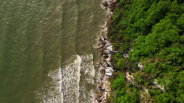 4K aerial top view, coast of mountains by the sea