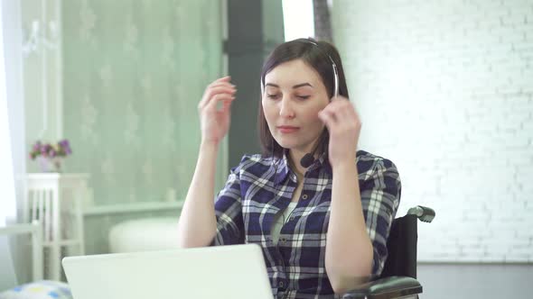 Young Woman Disabled Wheelchair Remote Work at Home Computer Headset