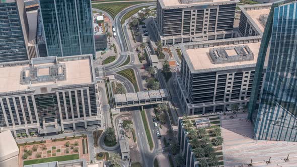 Dubai Downtown Street with Busy Traffic and Office Buildings Around Timelapse
